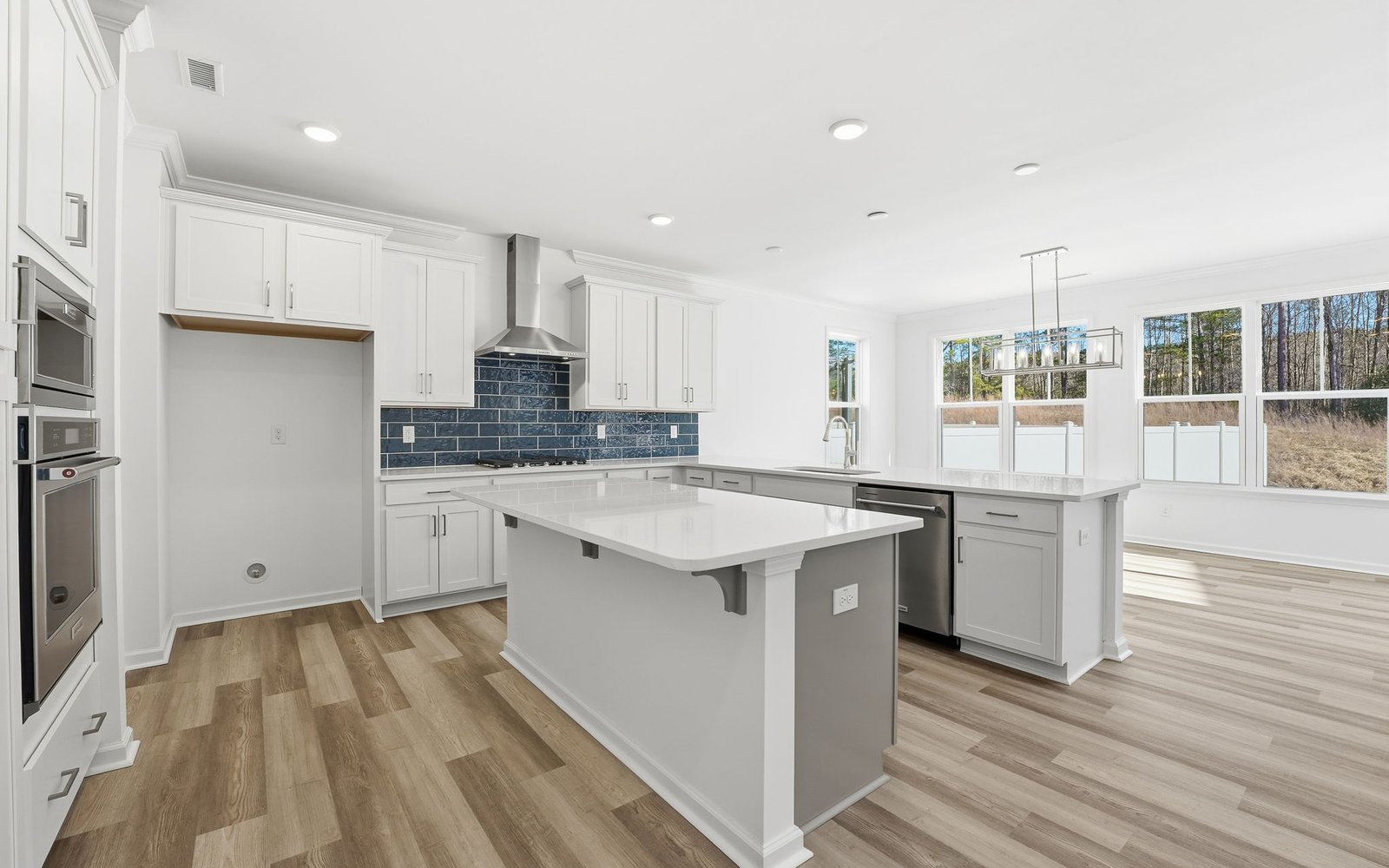 The kitchen and dining room of the Sterling at Wendell Falls.