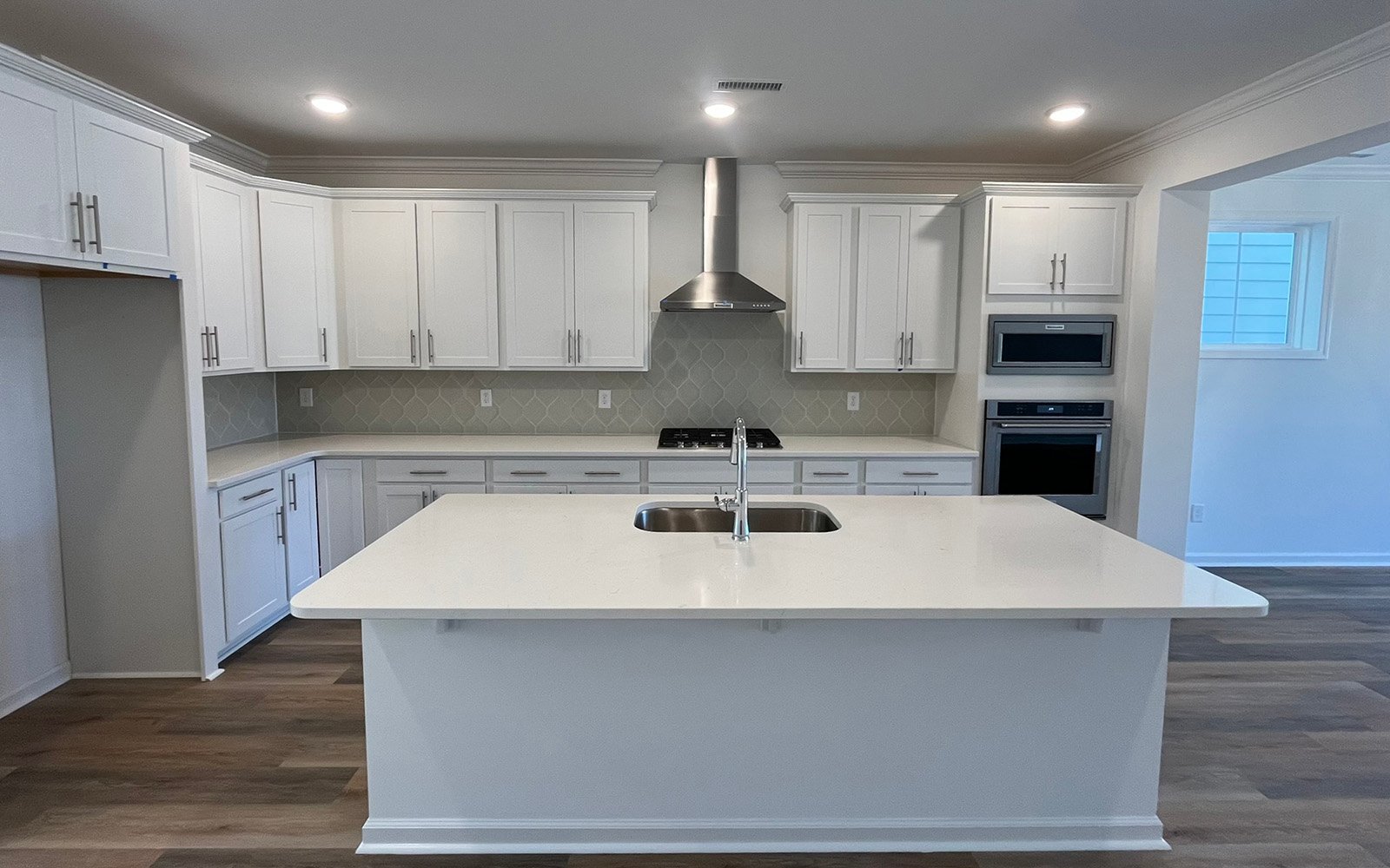 The kitchen in the Declan on homesite 2433 by Brookfield Residential at Wendell Falls.
