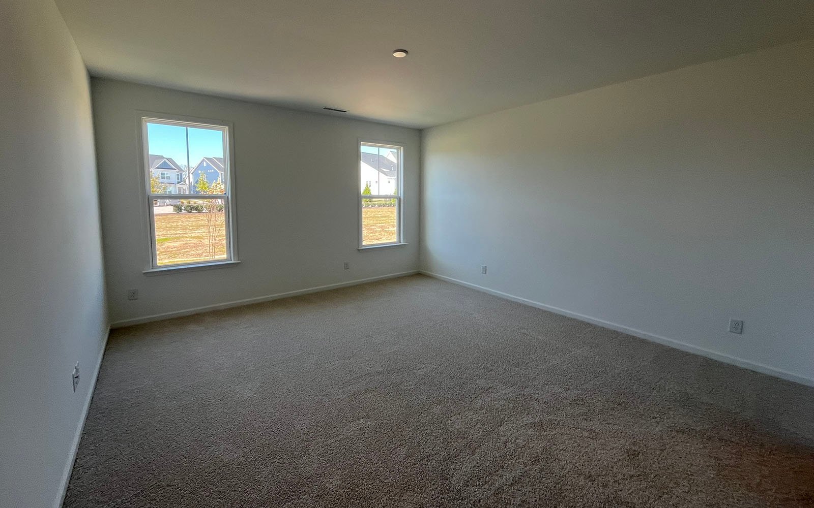 The primary bedroom in the Declan on homesite 2433 by Brookfield Residential at Wendell Falls.