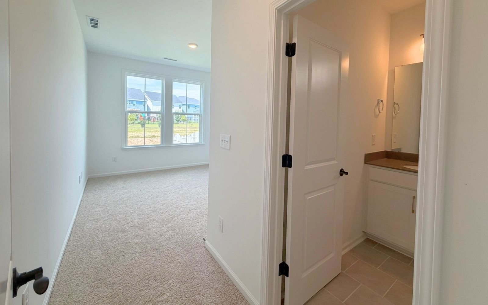 The main level guest room of the Grayson at Wendell Falls.