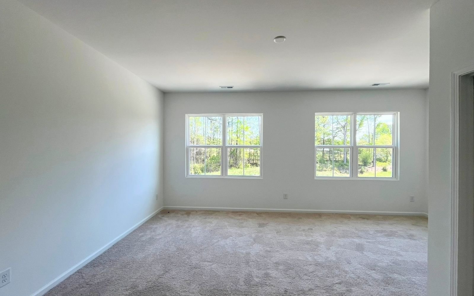 The primary bedroom of the Lennox on homesite 2566 at Wendell Falls.