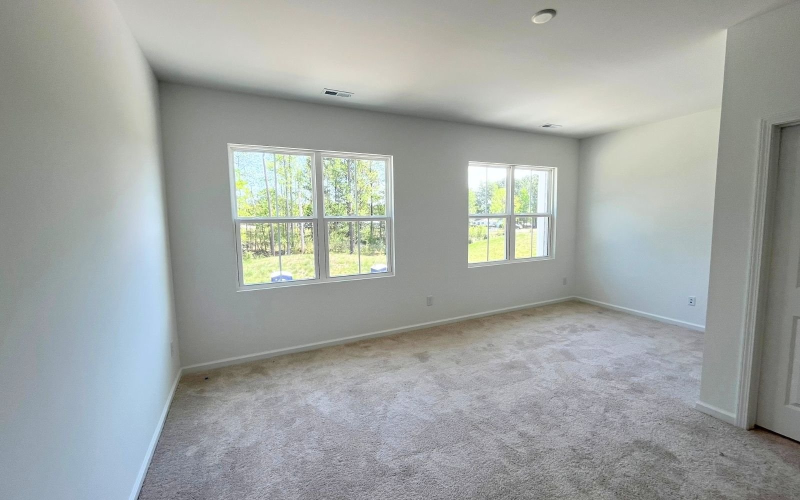 The primary bedroom of the Lennox on homesite 2566 at Wendell Falls.