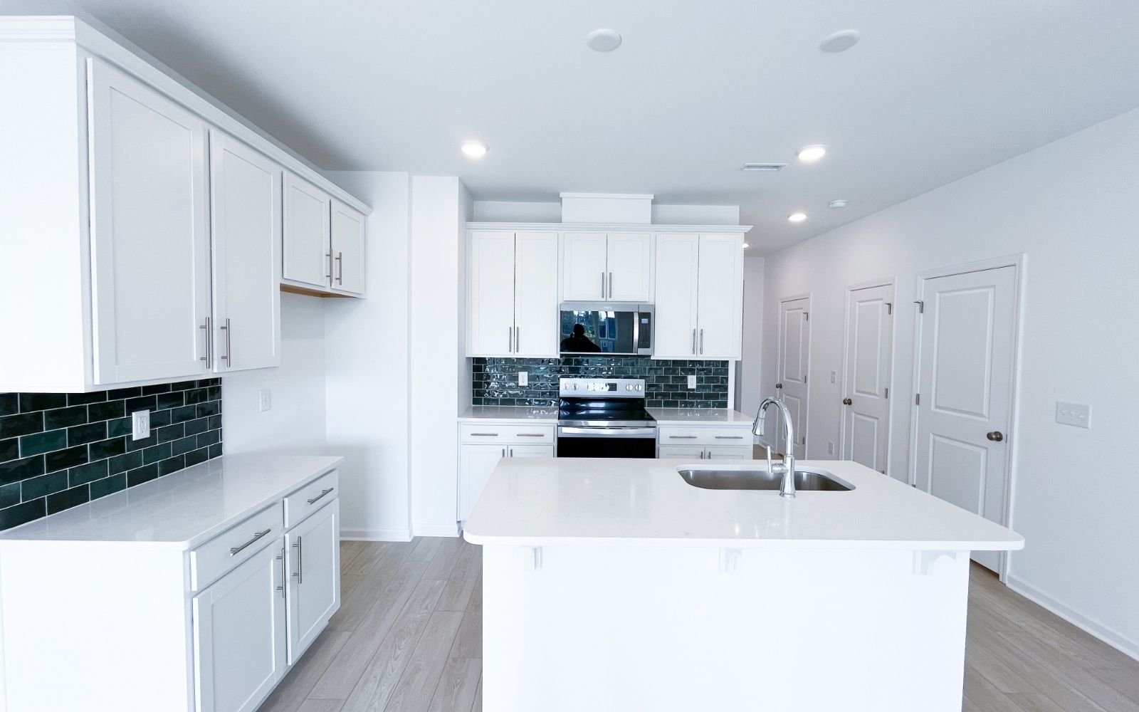 The kitchen of the Lennox on homesite 2575 by Brookfield Residential.