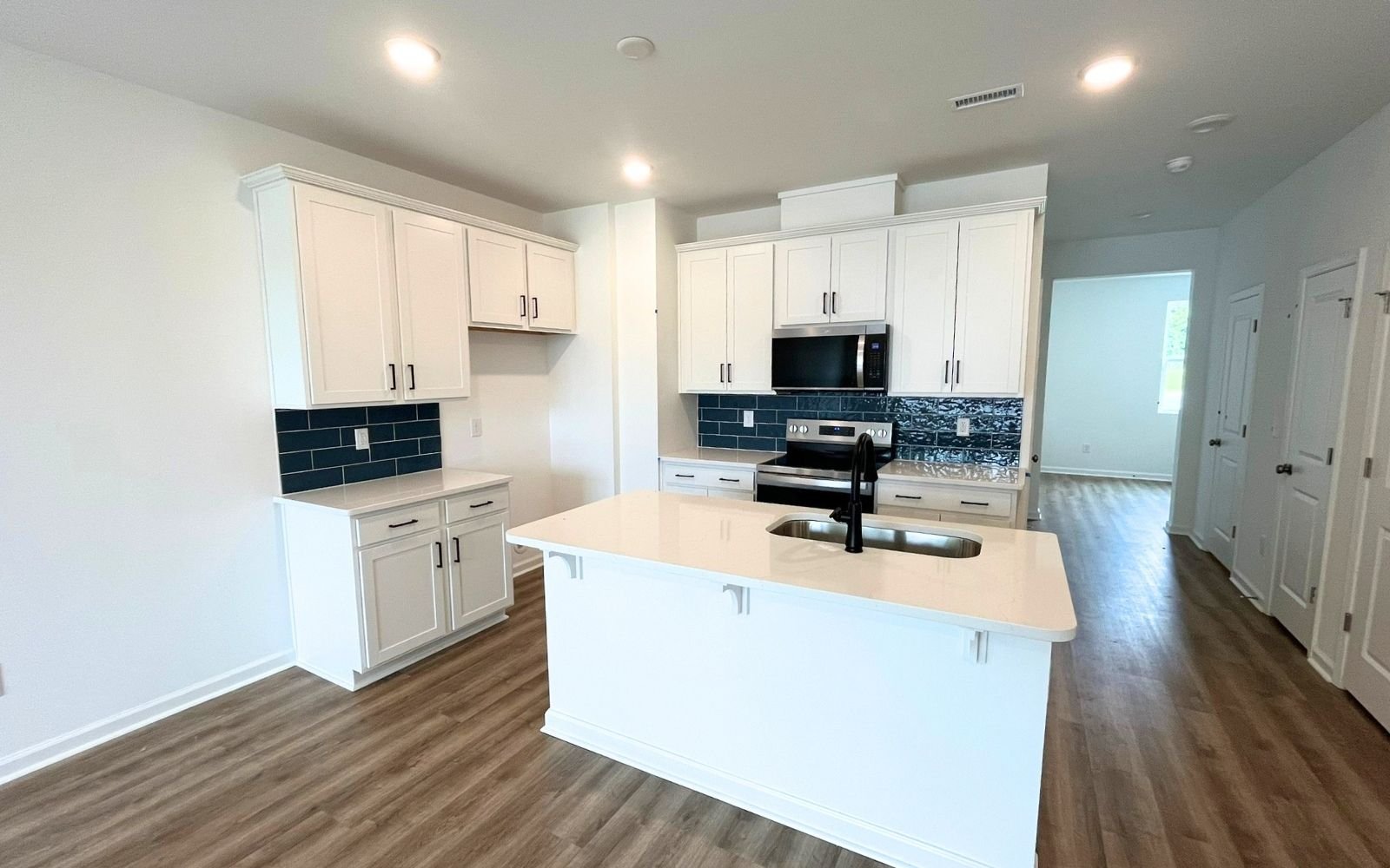 The kitchen of the Lennox on homesite 2579 by Brookfield Residential at Wendell Falls.