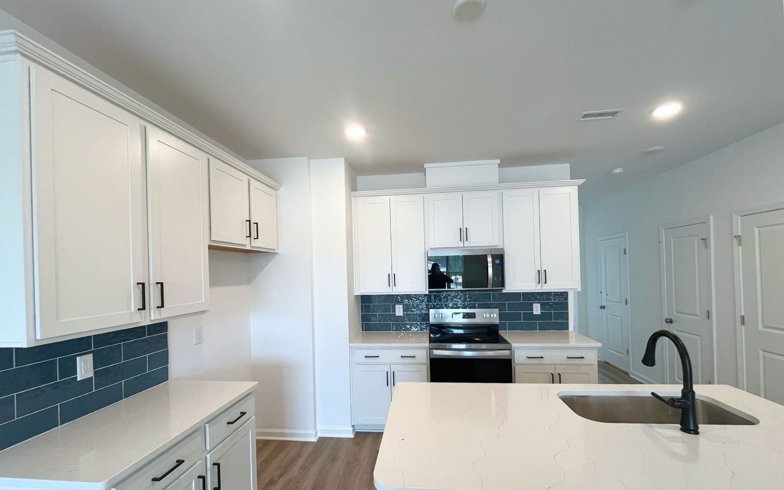 The kitchen of the Lennox on homesite 2579 by Brookfield Residential at Wendell Falls.
