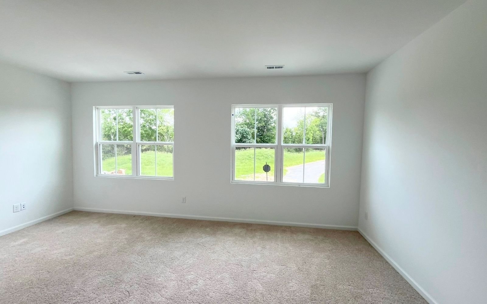 The primary bedroom of the Lennox on homesite 2579 by Brookfield Residential at Wendell Falls.