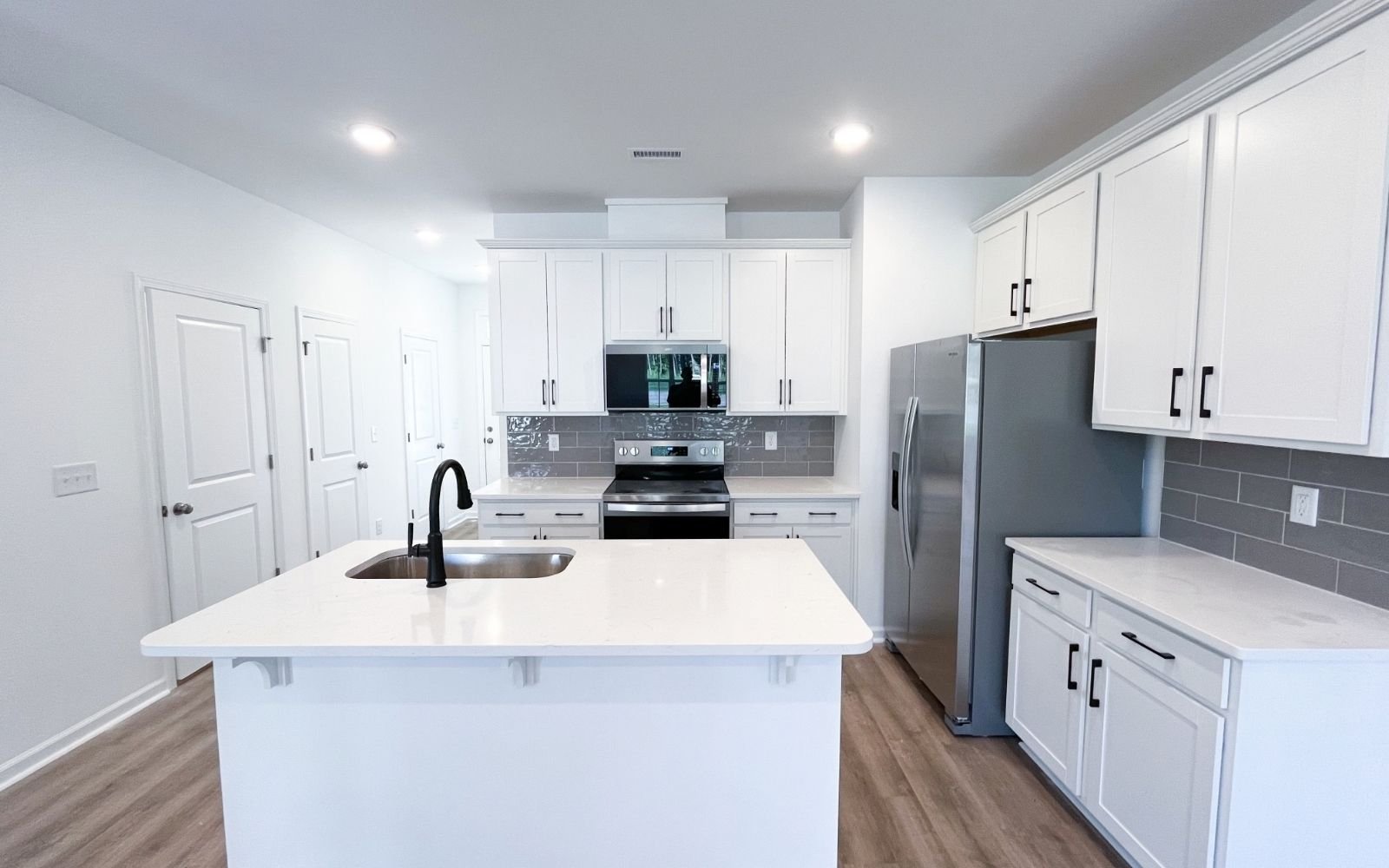 The kitchen of the Lennox on homesite 2935 by Brookfield Residential.
