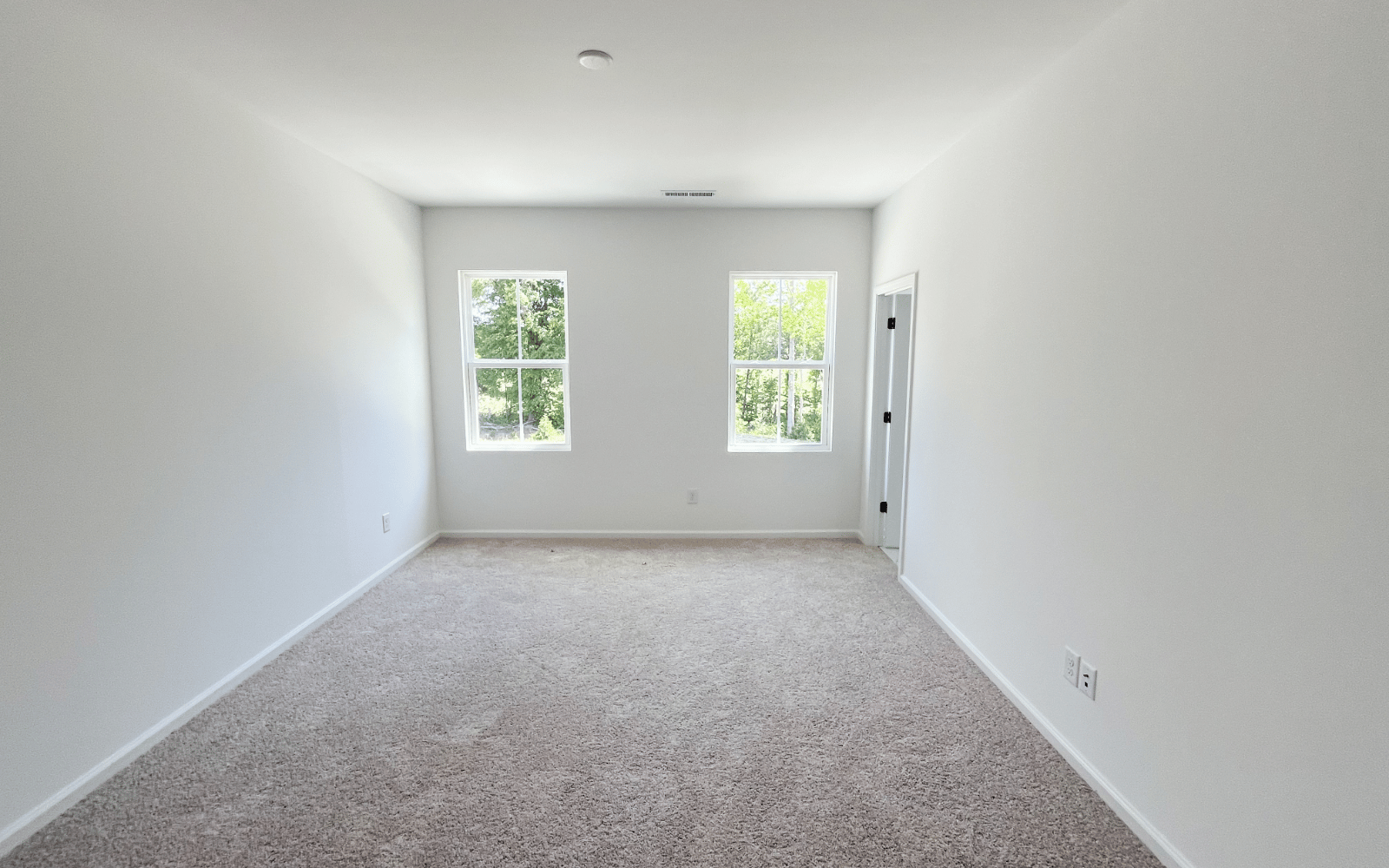 The primary bedroom of the Morgan on homesite 2569 by Brookfield Residential at Wendell Falls.