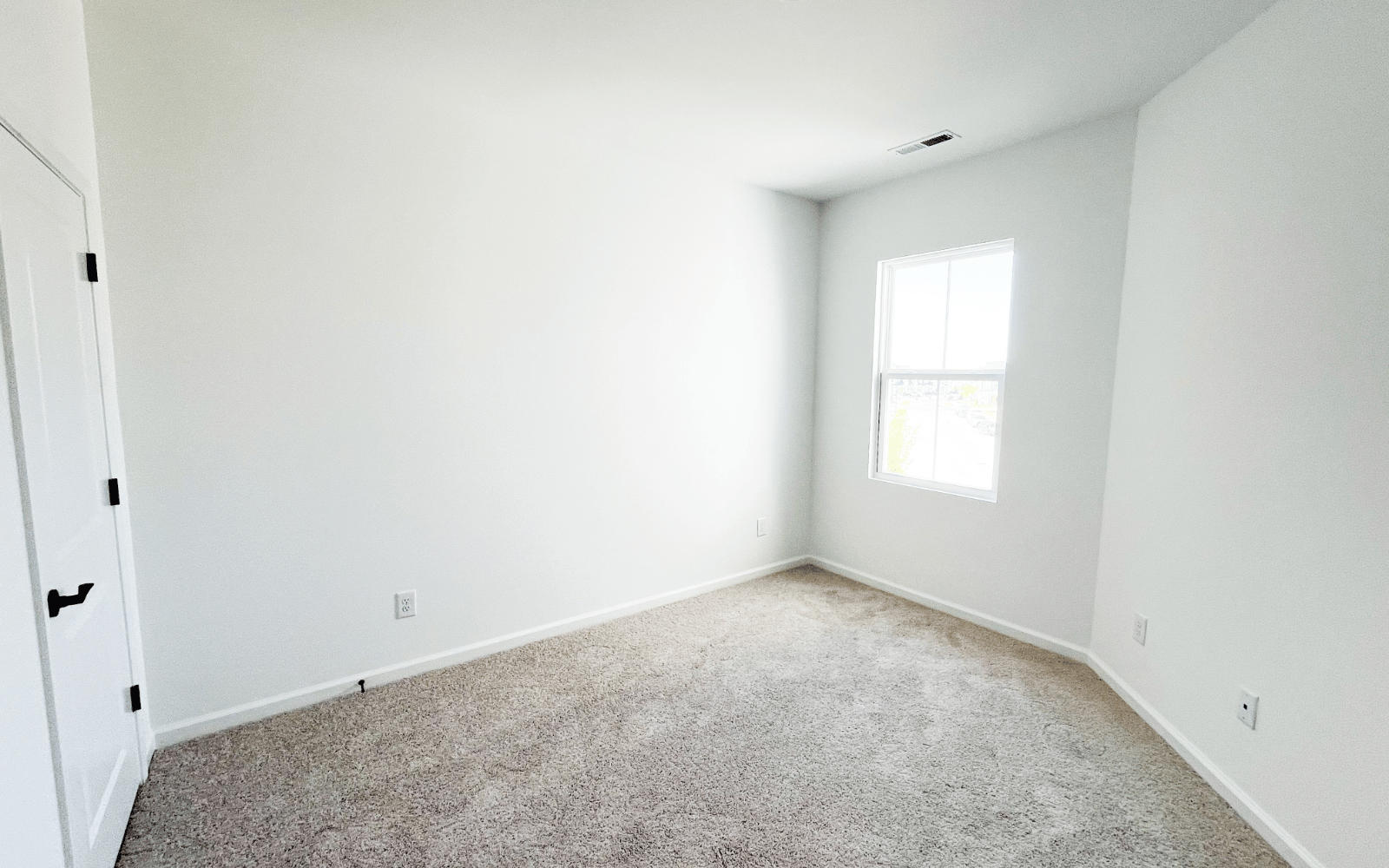 A secondary bedroom of the Morgan on homesite 2569 by Brookfield Residential at Wendell Falls.
