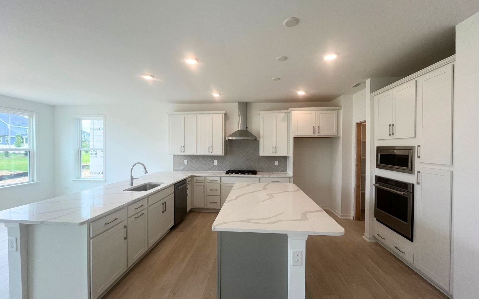 The kitchen of the Sterling on homesite 2436 by Brookfield Residential at Wendell Falls.