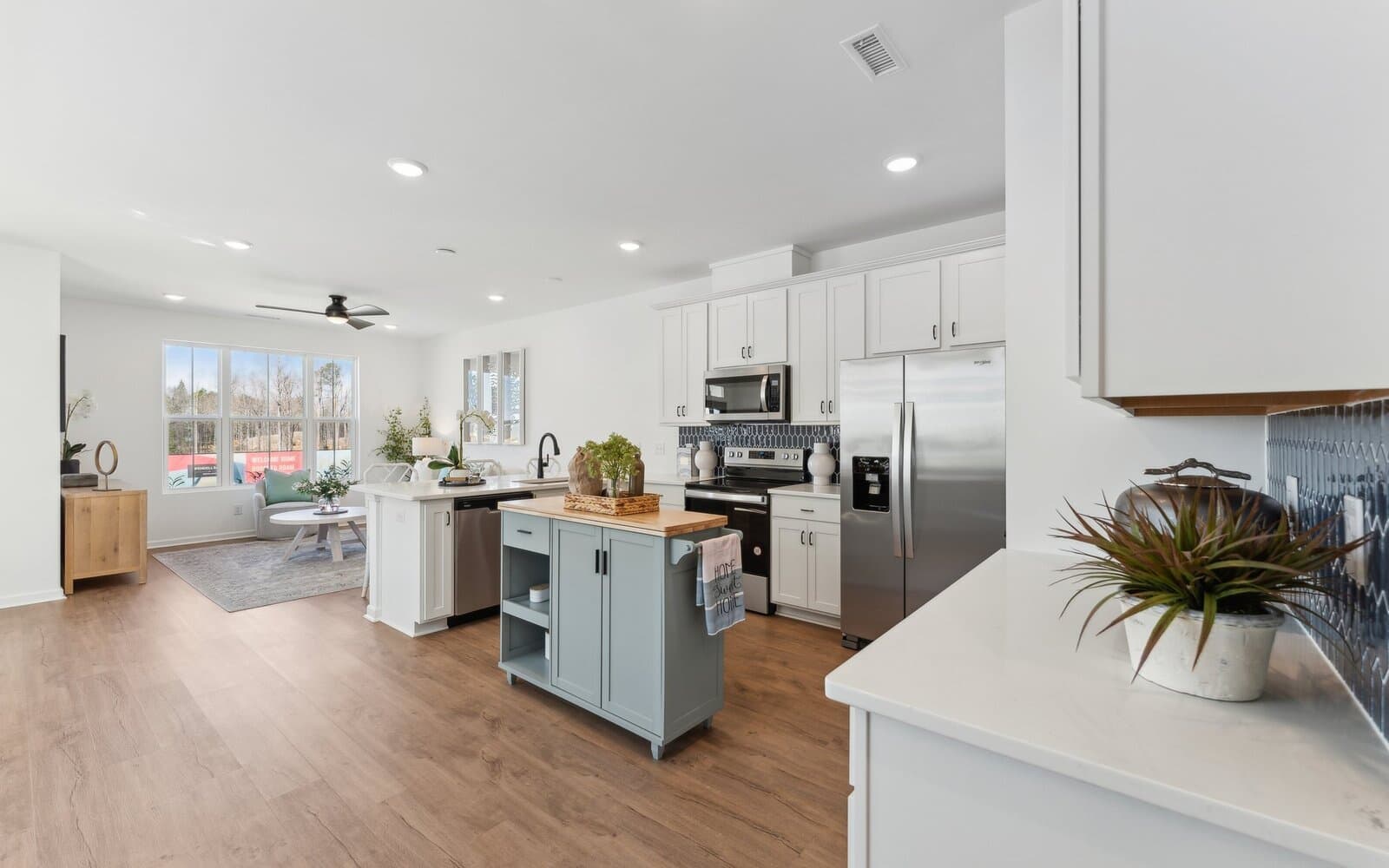 The kitchen of the Morgan townhome model by Brookfield Residential at Wendell Falls.