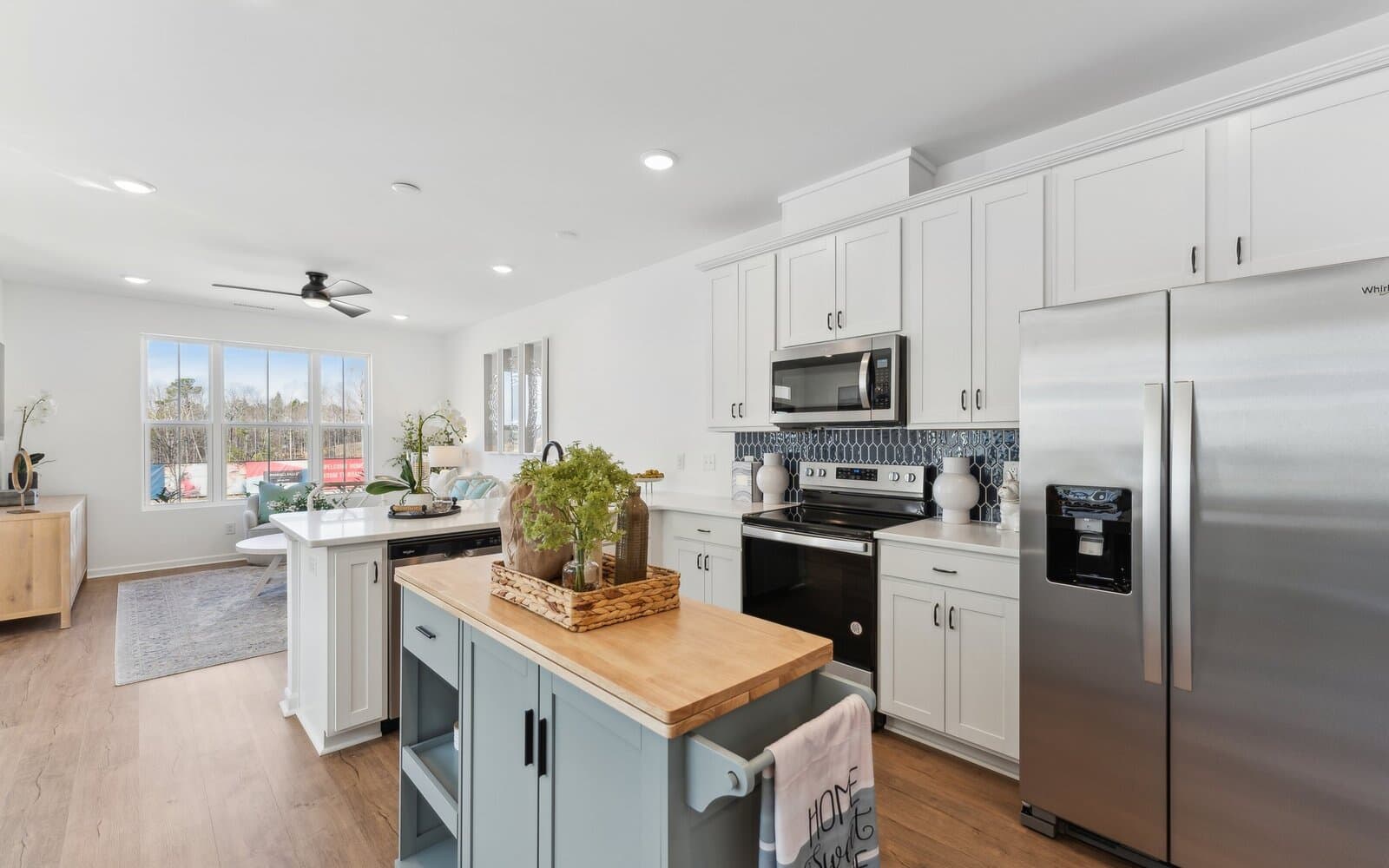 The kitchen of the Morgan townhome model by Brookfield Residential at Wendell Falls.