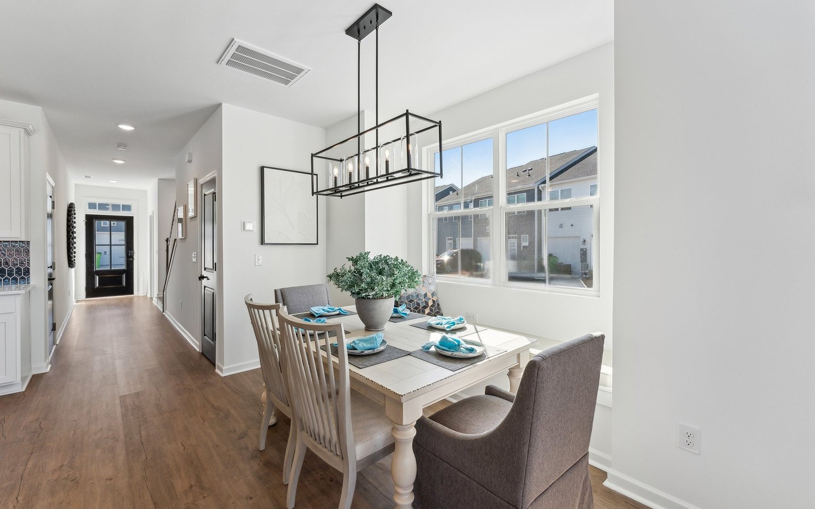 The dining room in the Morgan townhome by Brookfield Residential at Wendell Falls.