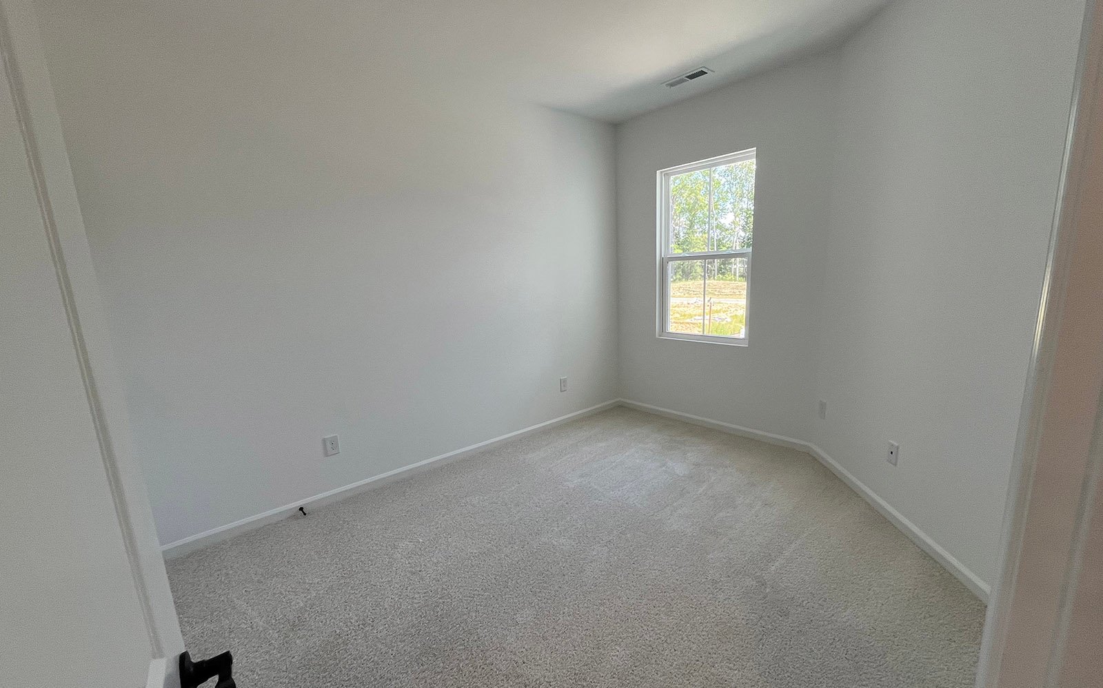 Bedroom 2 of the Morgan at Wendell Falls on homesite 2538.