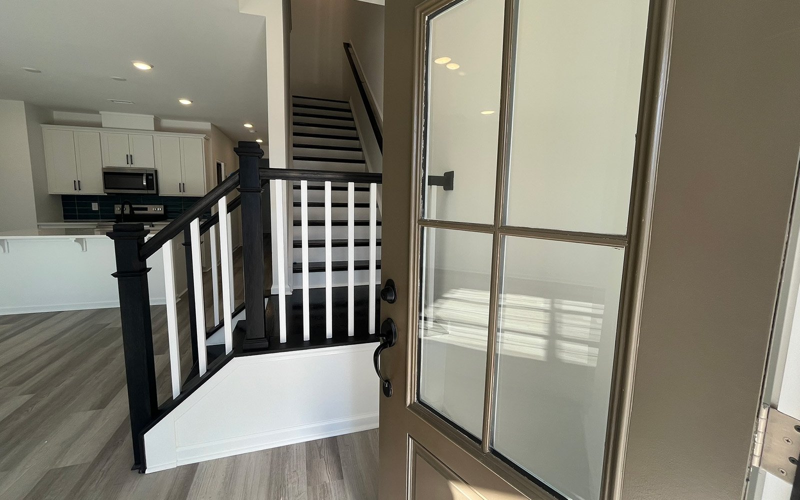 The entrance of the Lennox on homesite 2554 by Brookfield Residential at Wendell Falls.