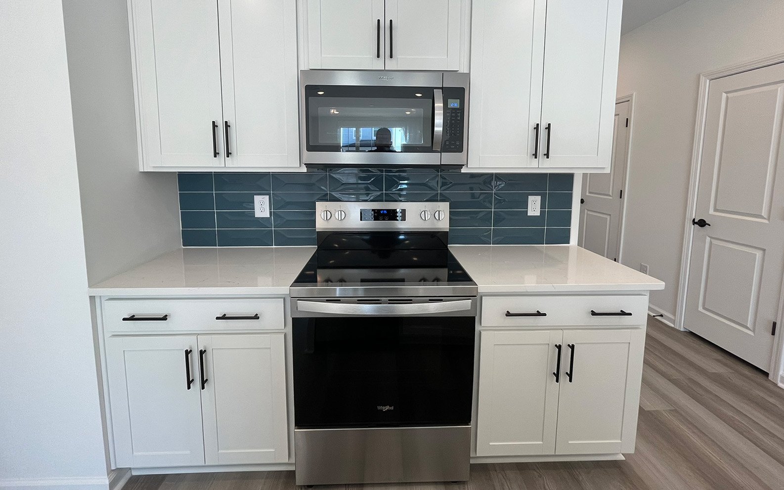 The kitchen in the Lennox on homesite 2554 by Brookfield Residential at Wendell Falls.