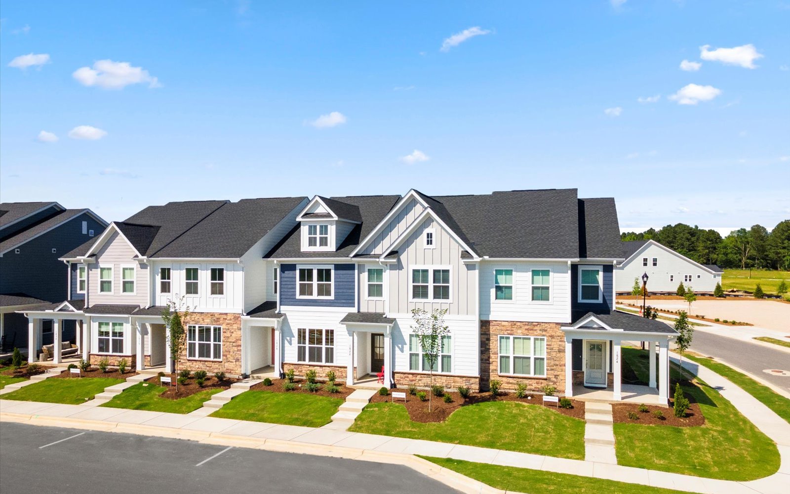 An exterior view of the townhomes by Brookfield Residential at Wendell Falls.
