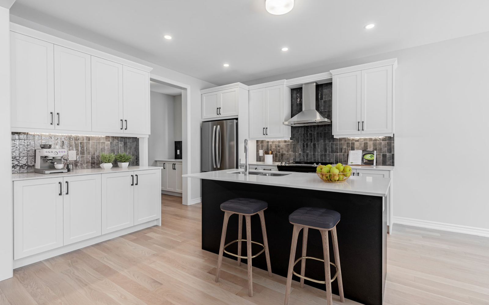 Virtually staged photo of the kitchen in Lot 4 at Heartland in Baxter, Ontario
