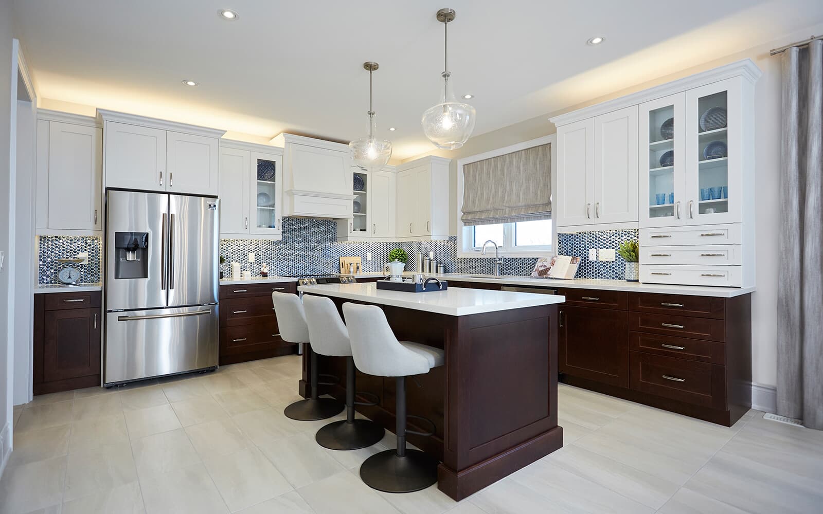 Kitchen in the Westwood Model Home at Heartland in Baxter, Ontario.