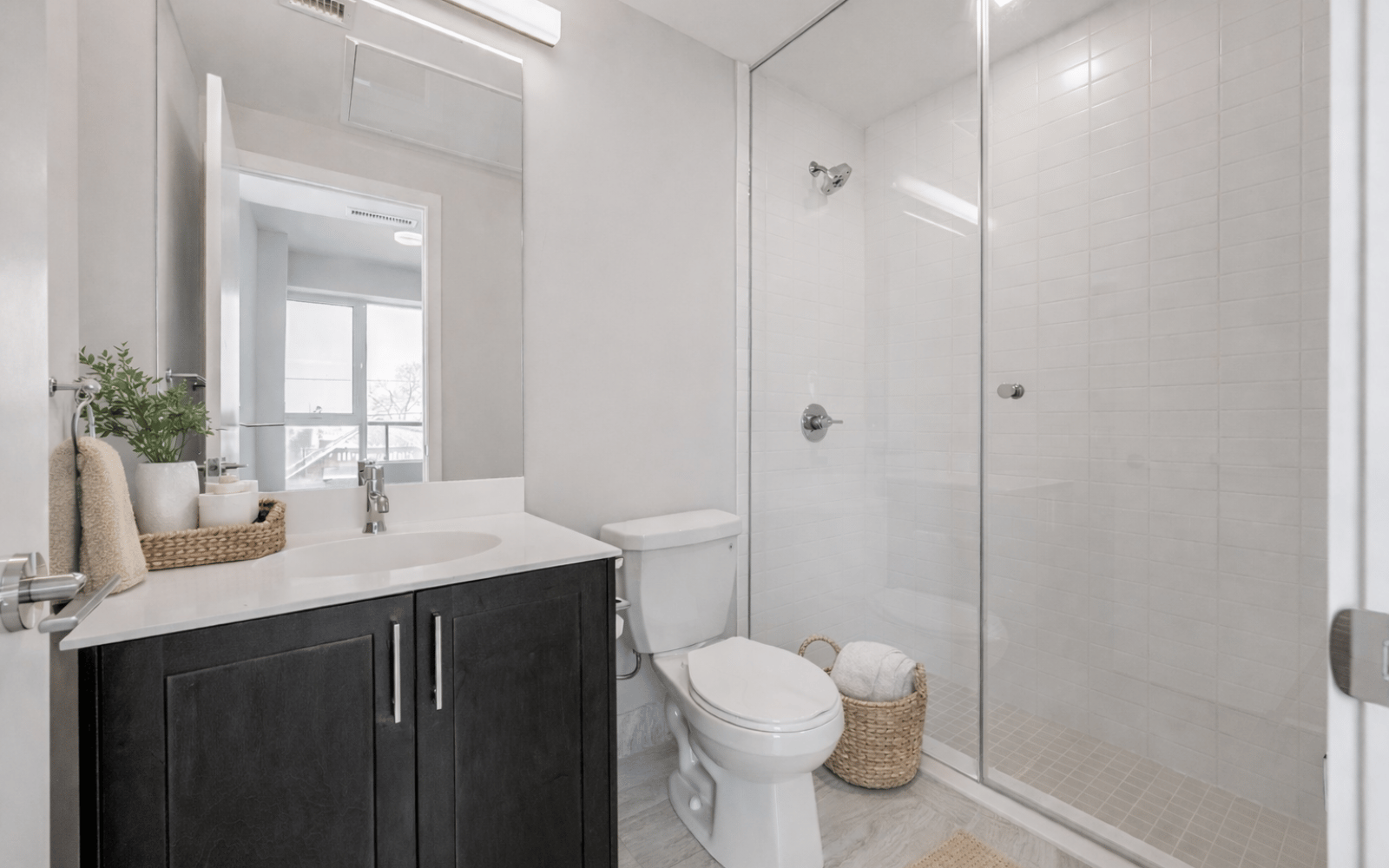 Virtually staged photo of the ensuite in a Trent suite at Station No. 3 in Whitby, ON