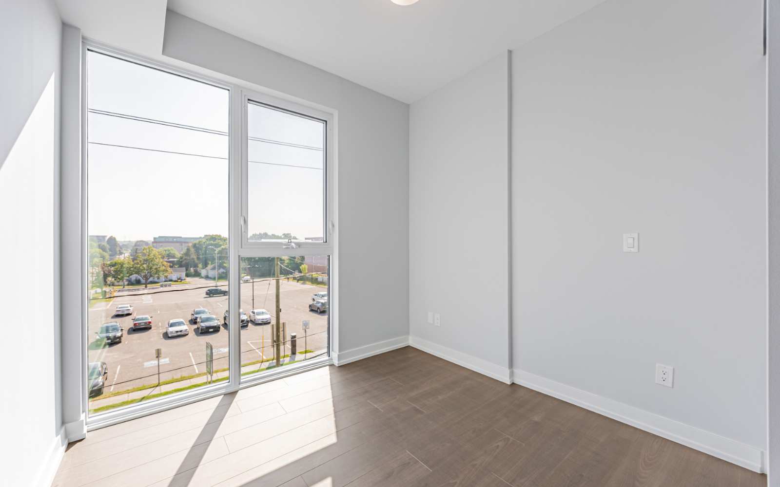 Photo of the bedroom in Suite 208 at Station No. 3 in Whitby, ON