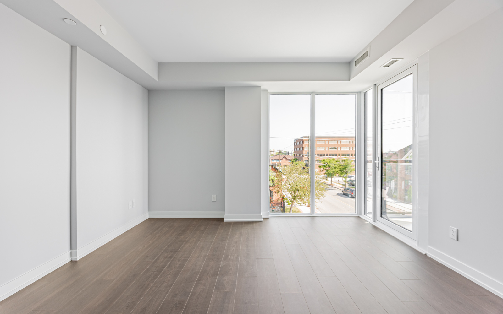 Photo of the living room in Suite 208 at Station No. 3 in Whitby, ON