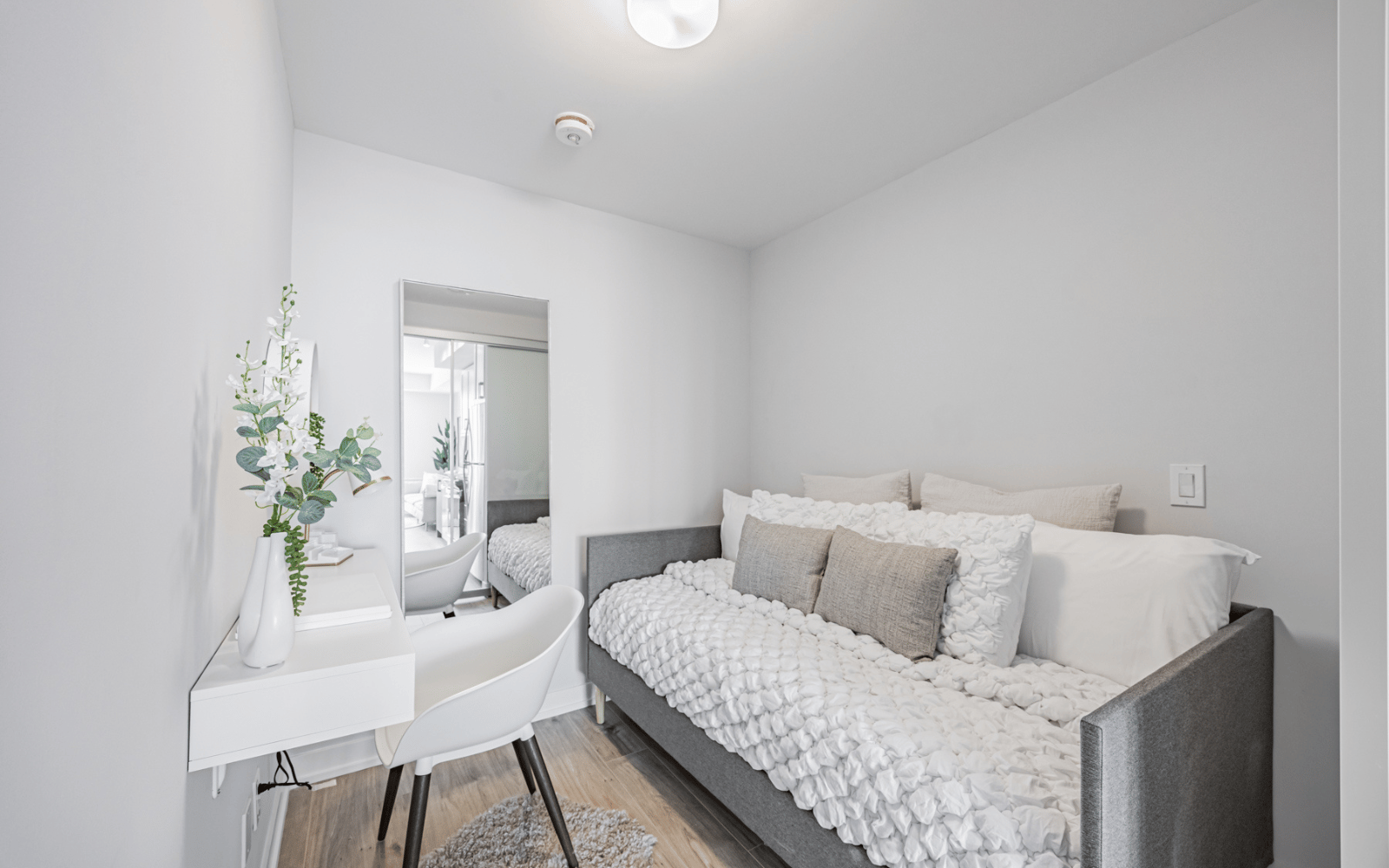 Den living for Suite 212 at Station No. 3