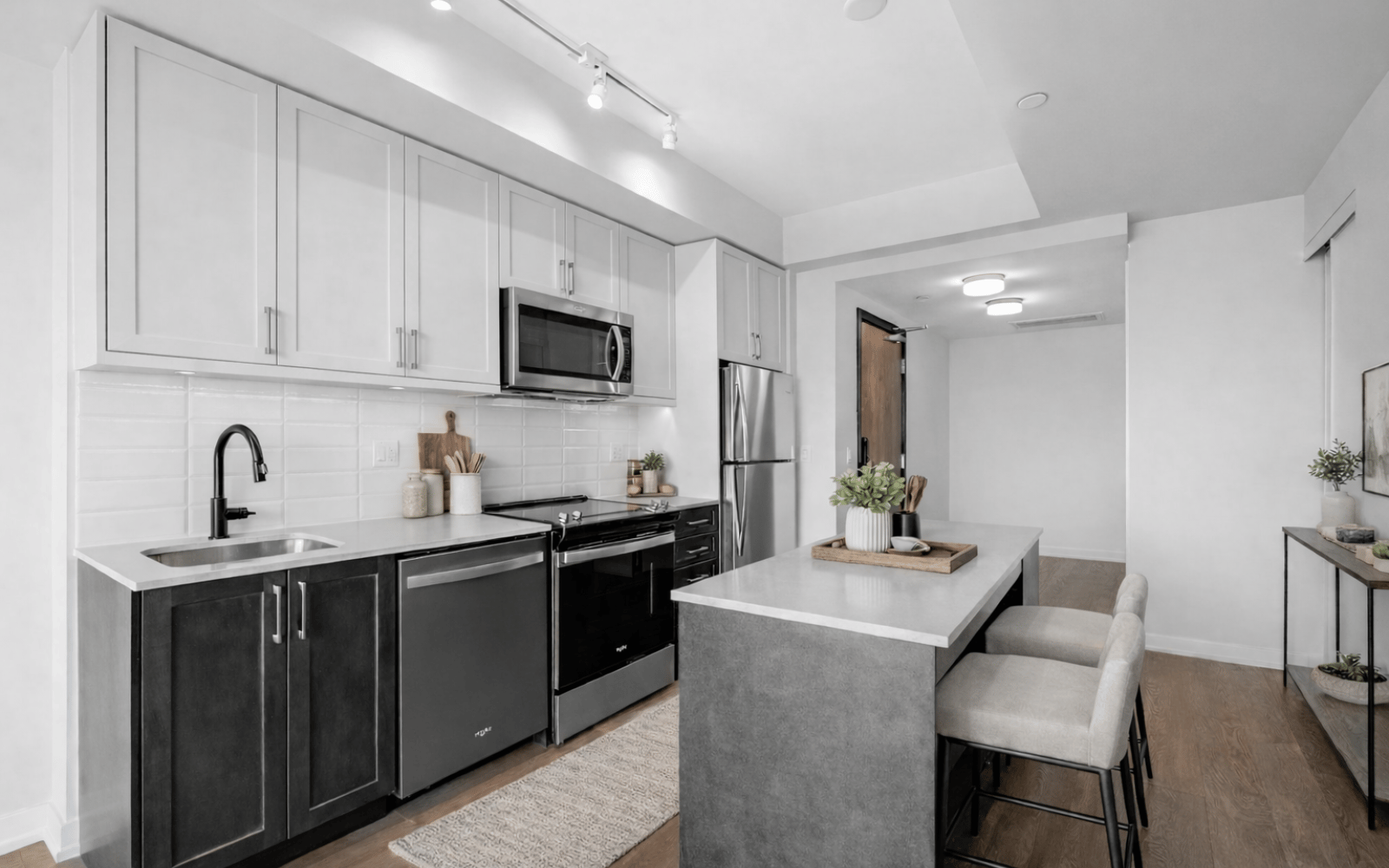 Virtually staged photo of a kitchen in the Pine suite at Station No. 3 in Whitby, ON