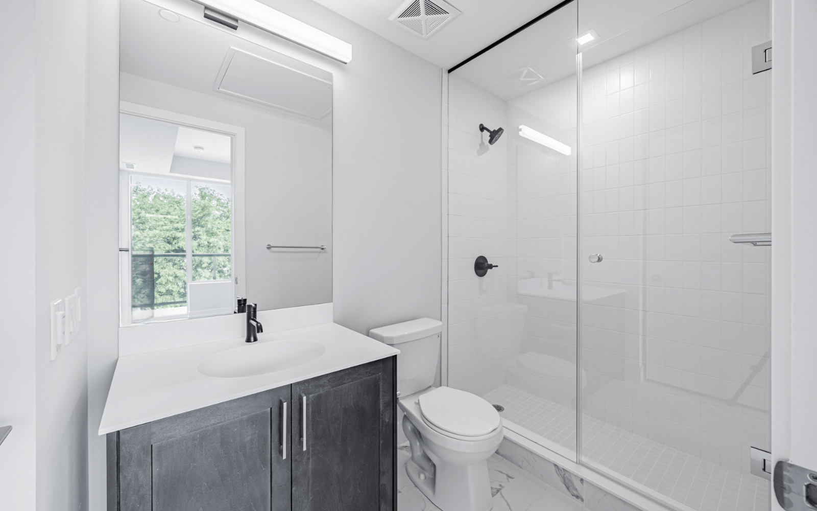 Bathroom photo of a Walnut suite at Station No. 3 in Whitby, ON