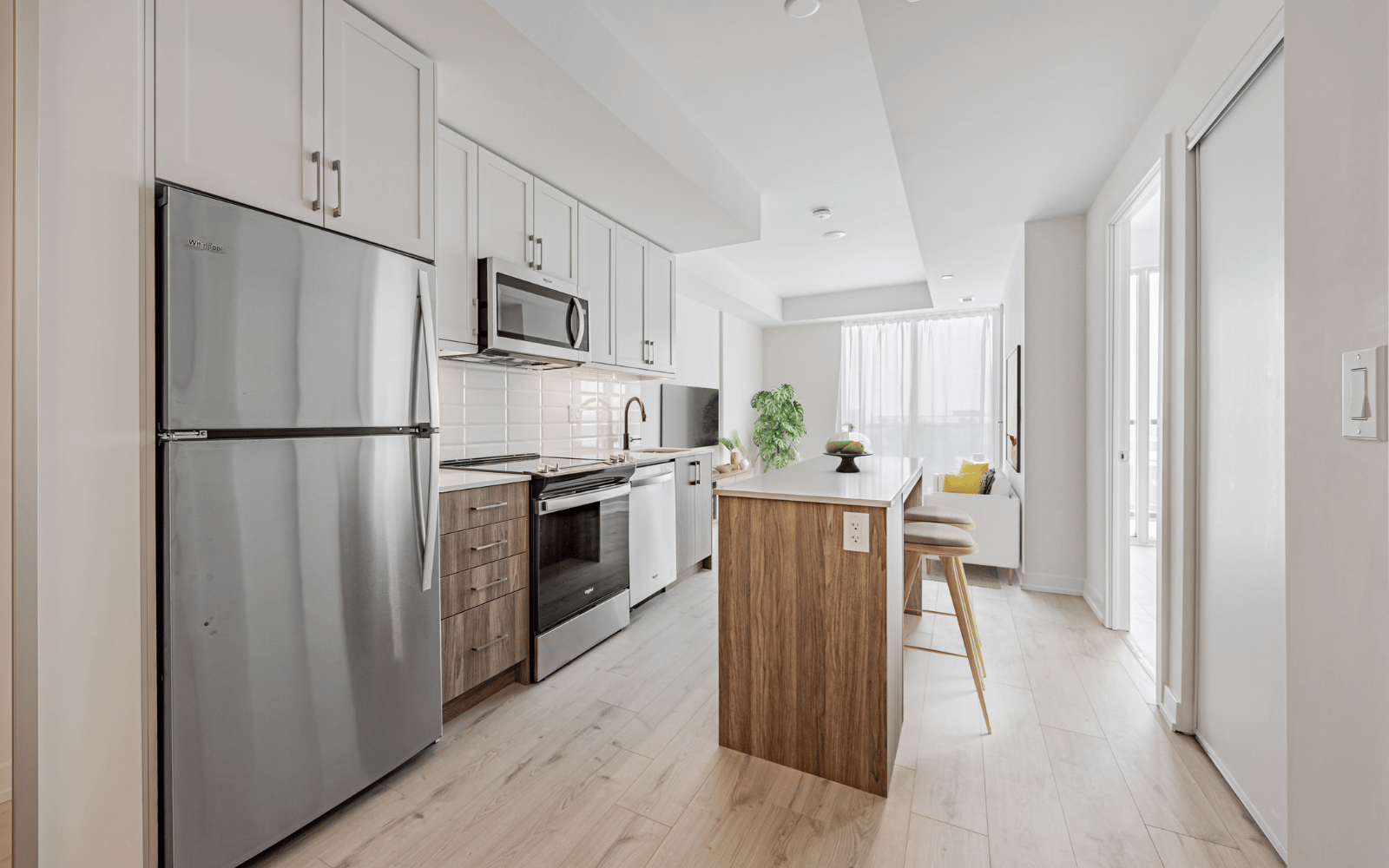 Virtually staged photo of the kitchen in a Green plan at Station No. 3 in Whitby, ON