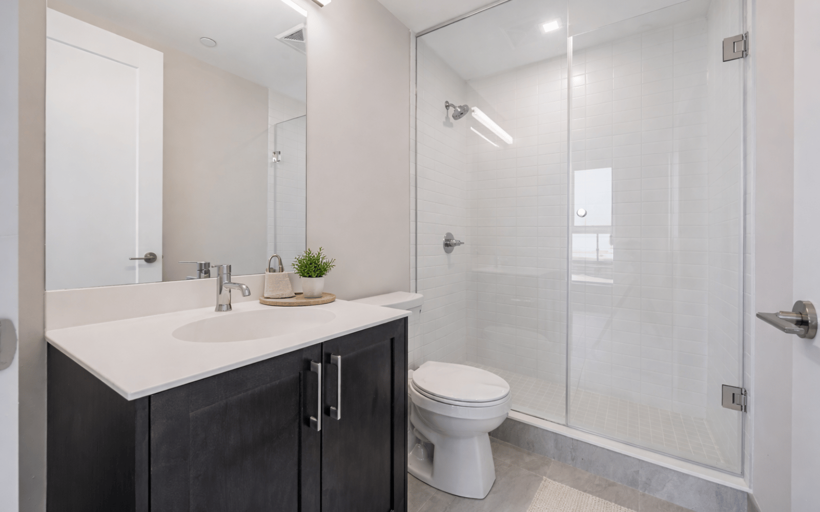 Virtually staged photo of the bathroom in a Hopkins suite at Station No. 3 in Whitby, ON