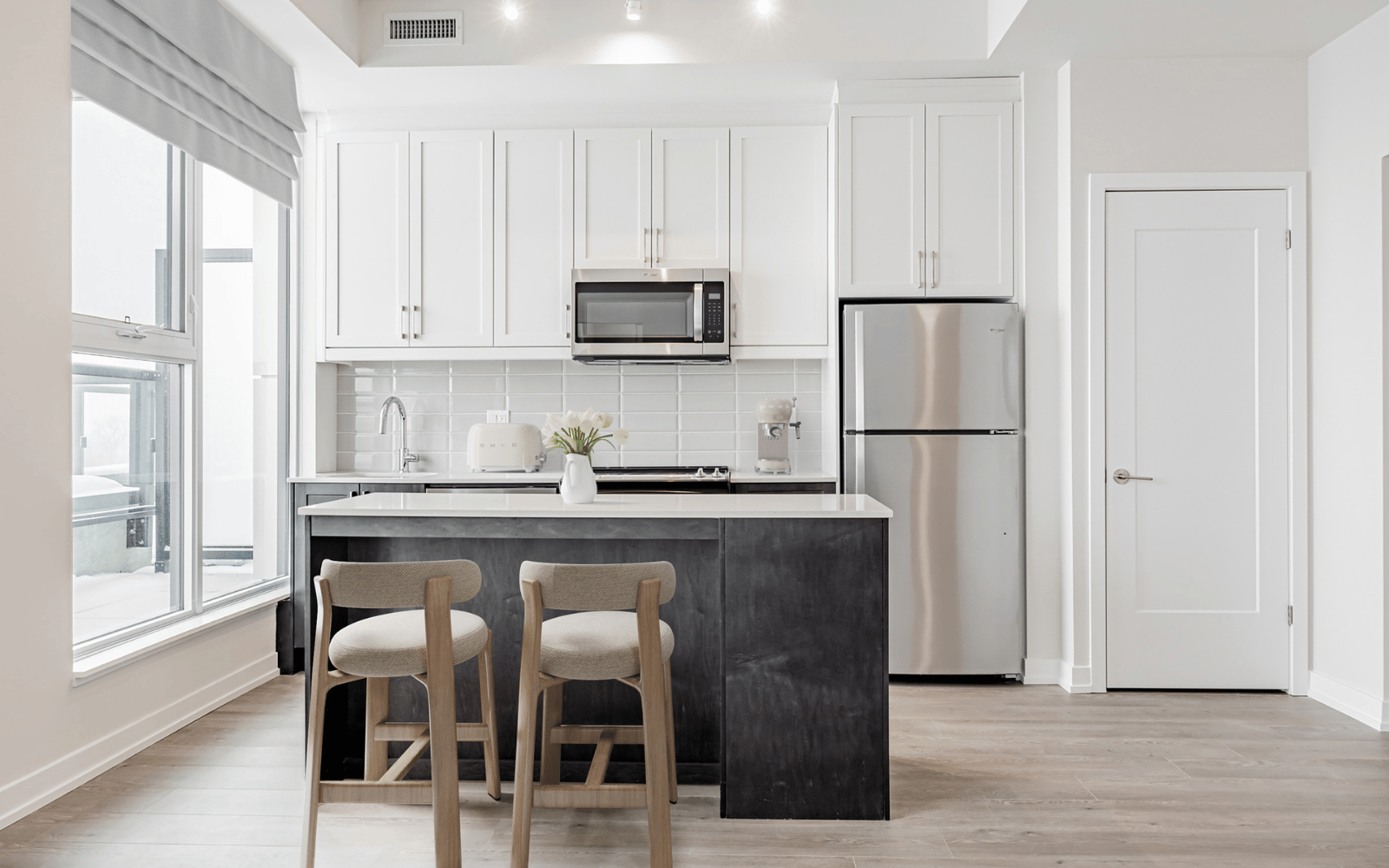 Virtually staged photo of the kitchen in a Hopkins plan at Station No. 3 in Whitby, ON
