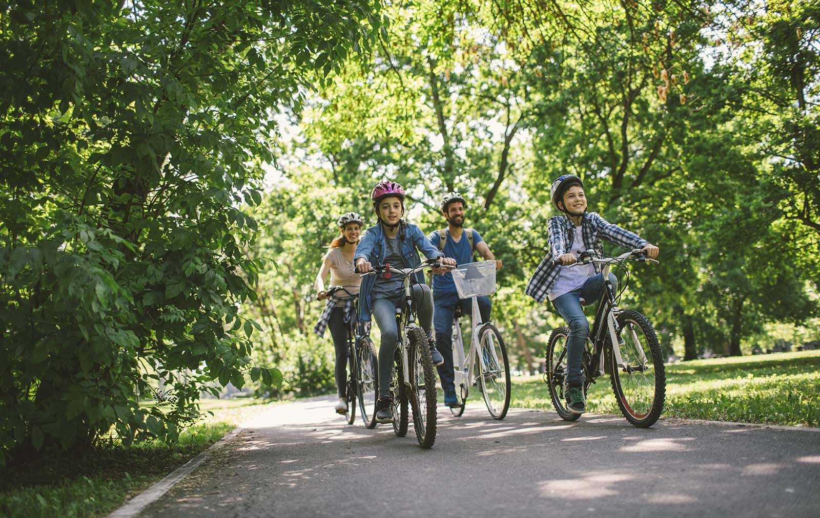 Family bike riding together