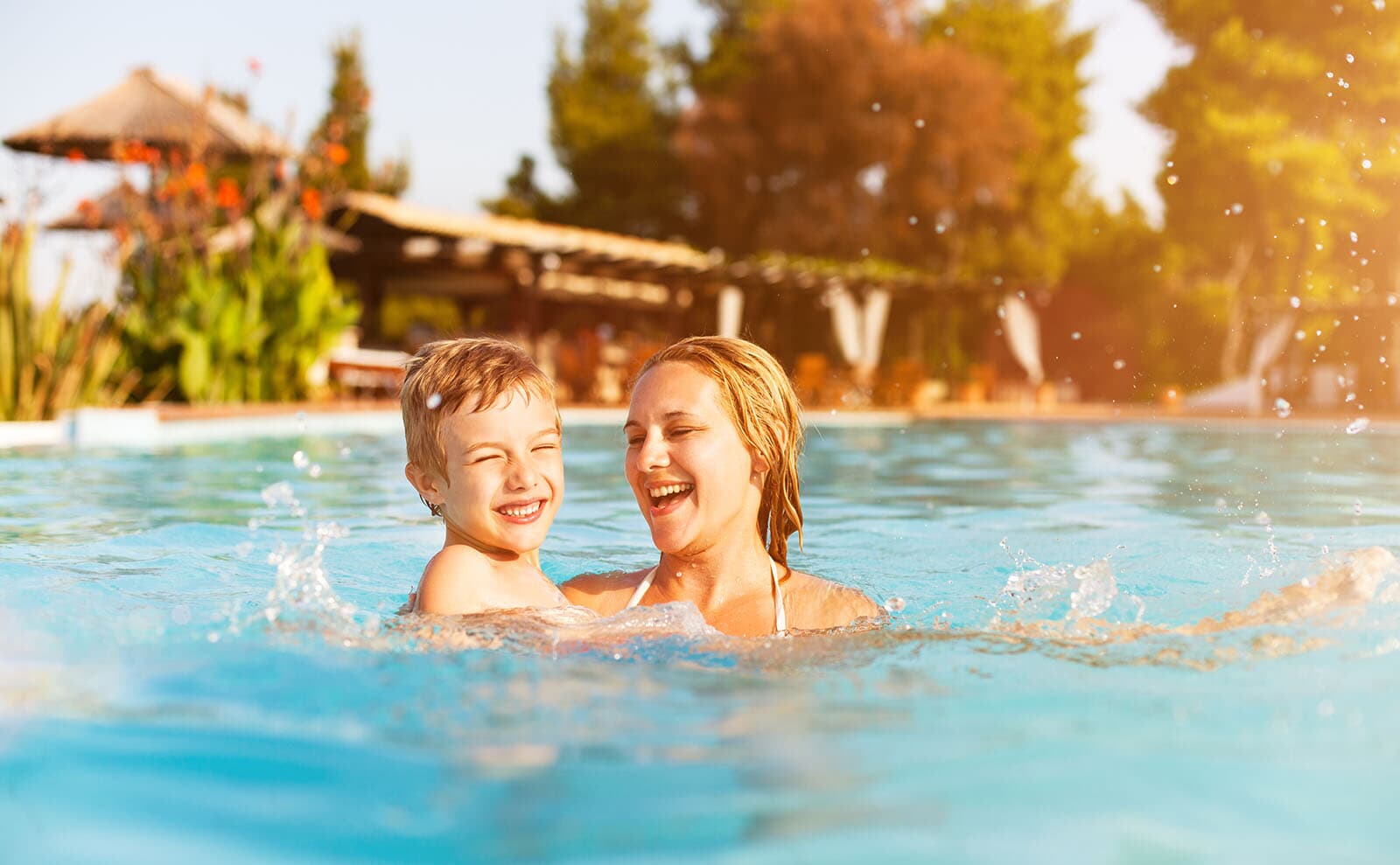 Mother and child enjoying the pool
