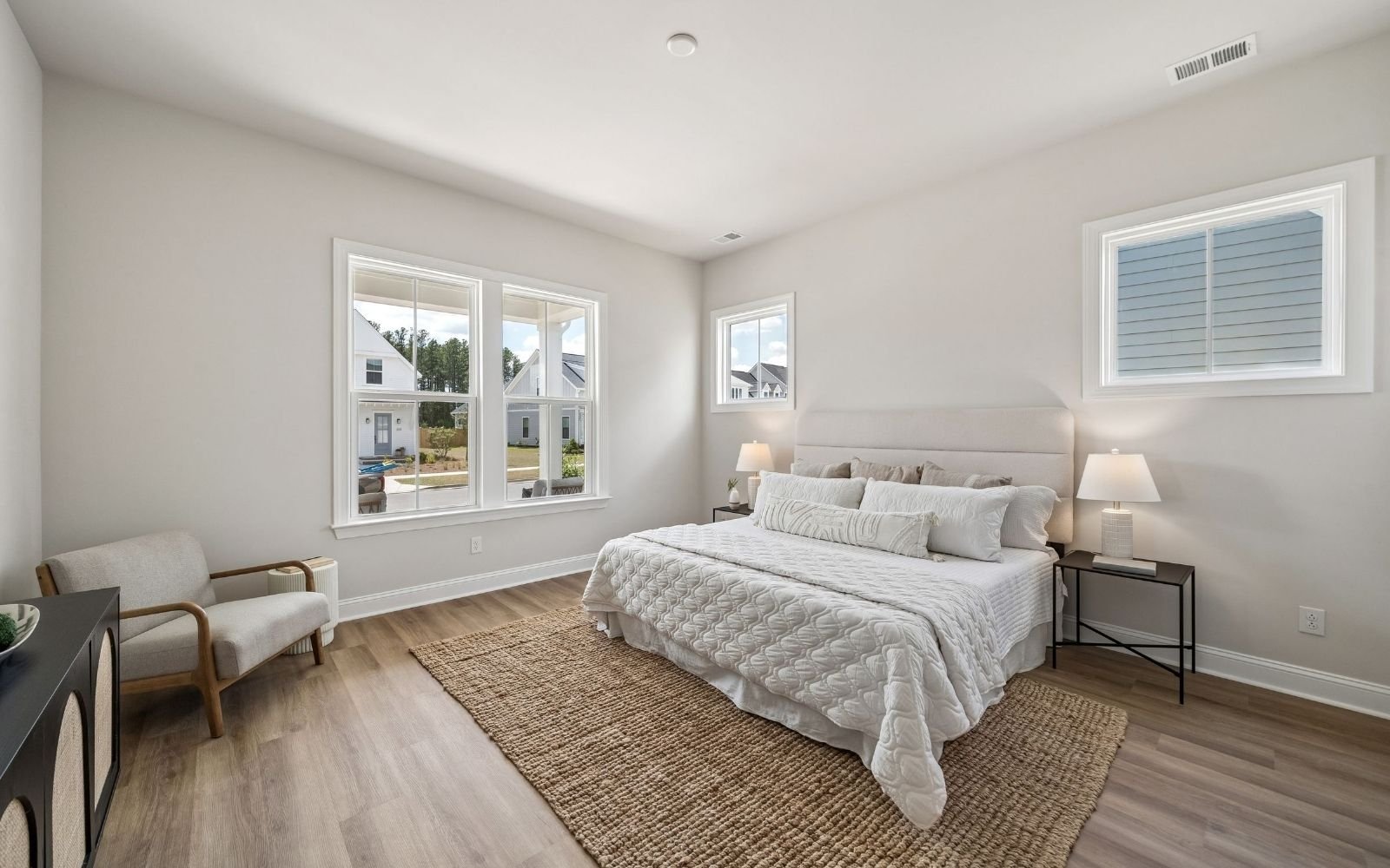 The primary bedroom of the Cordova by Brookfield Residential at Nexton.