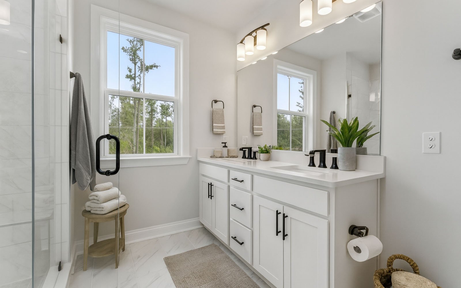 The primary bathroom in the Preston single family home by Brookfield Residential at Nexton.