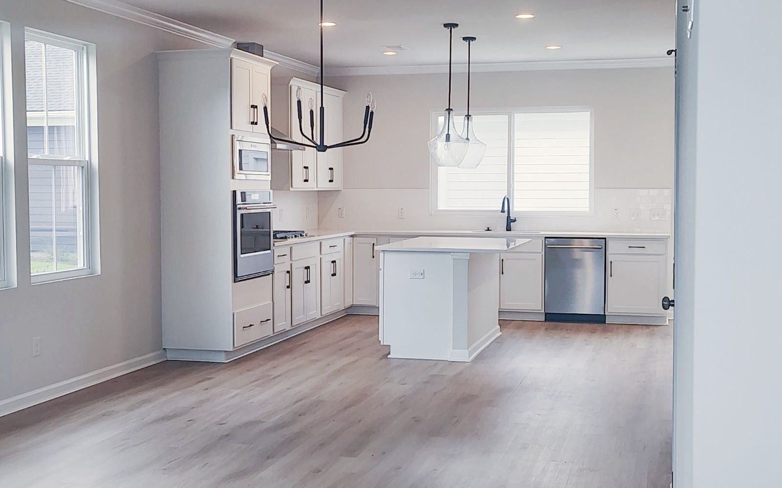 The kitchen and dining area of the Sage on homesite 223 at Nexton.