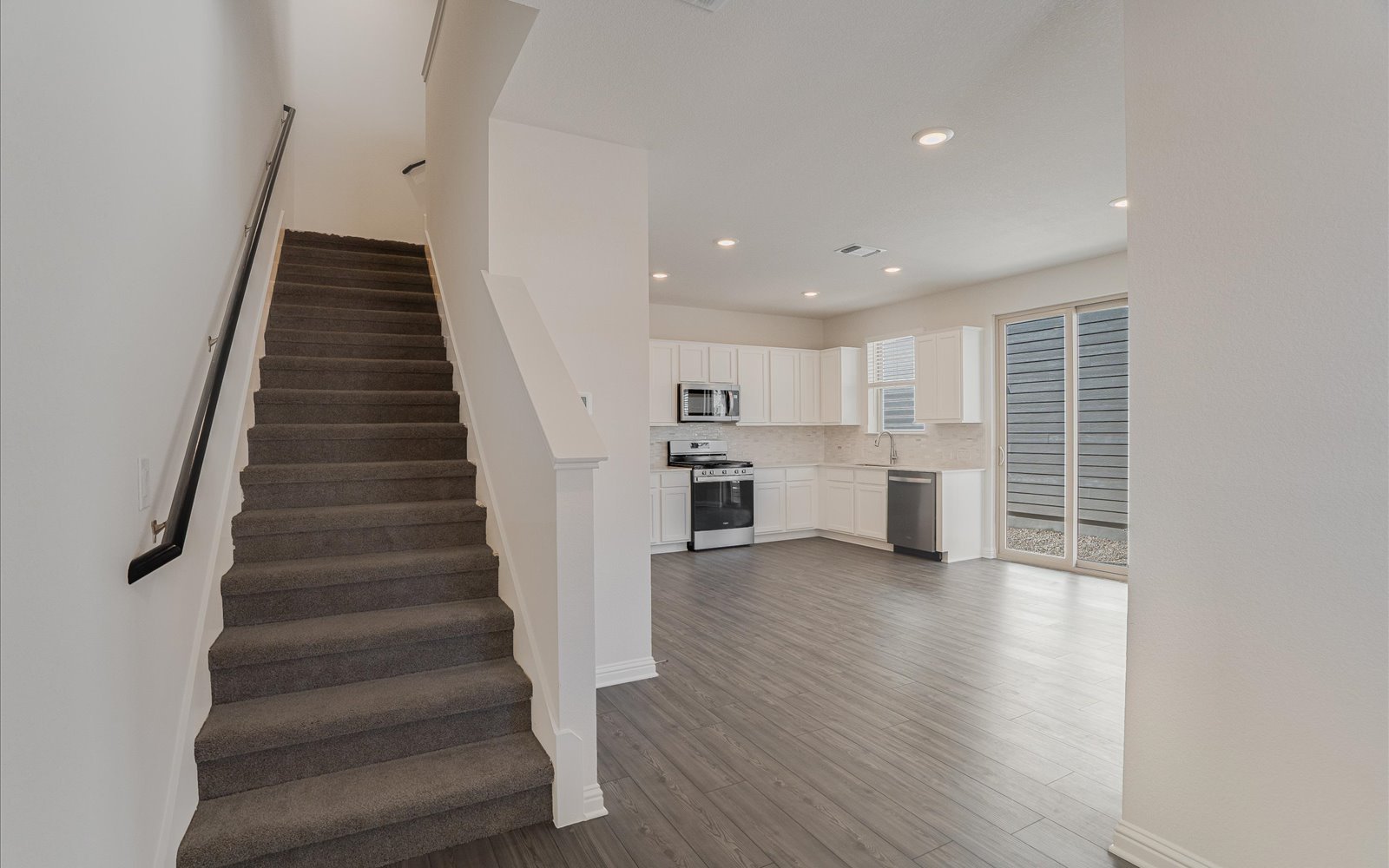 8208 Springsteen Stairs and Kitchen