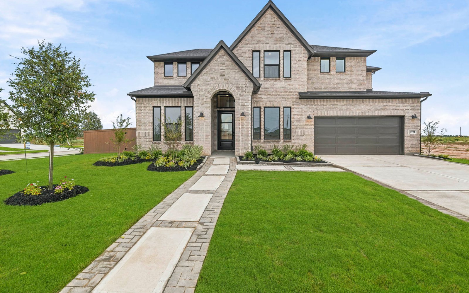 7703 Greyson Grove Front Exterior