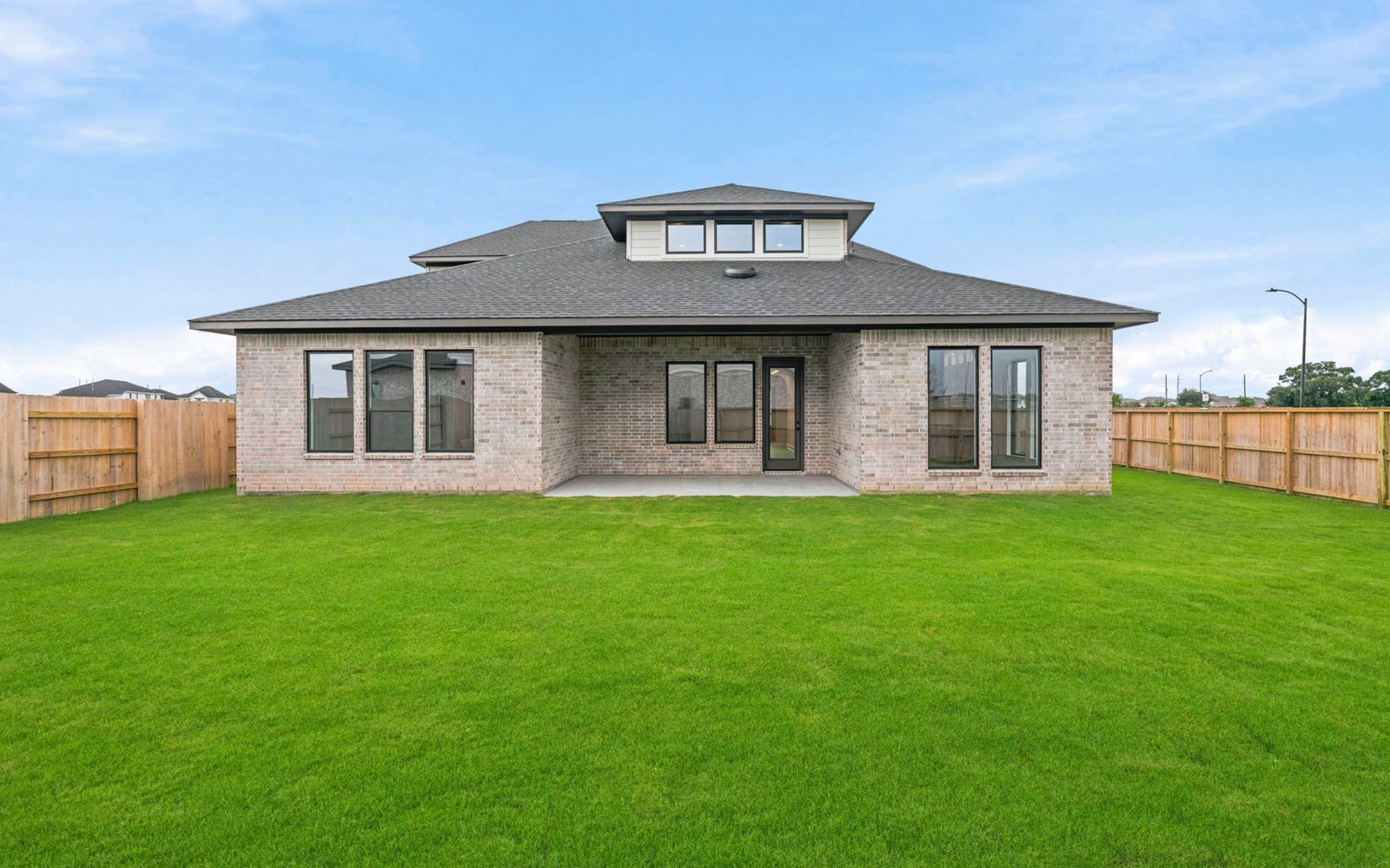 7703 Greyson Grove Back Exterior