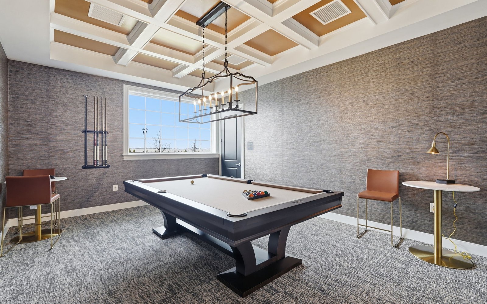 The billiards room in the community clubhouse at Hiatt Pointe at Snowden Bridge.