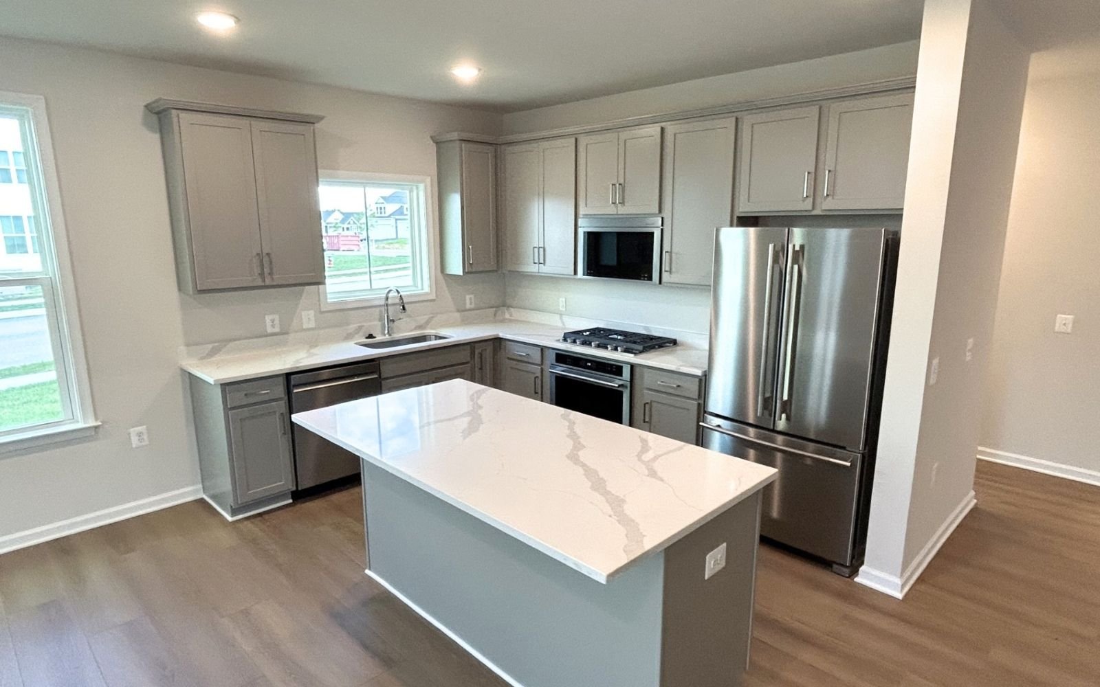 The kitchen of the Fitzgerald on homesite 2001 at Hiatt Pointe at Snowden Bridge.