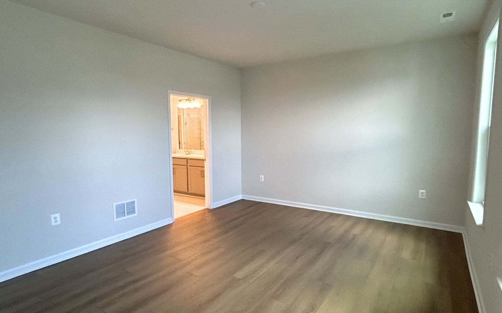 The primary bedroom of the Fitzgerald on homesite 2001 at Hiatt Pointe at Snowden Bridge.