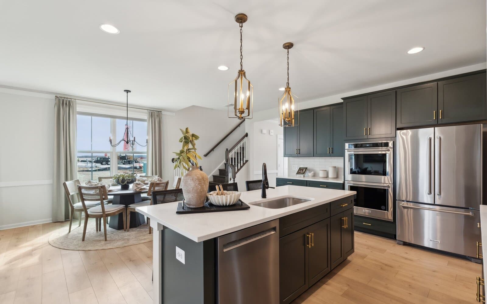 The kitchen and dining room of the Hemingway by Brookfield Residential.