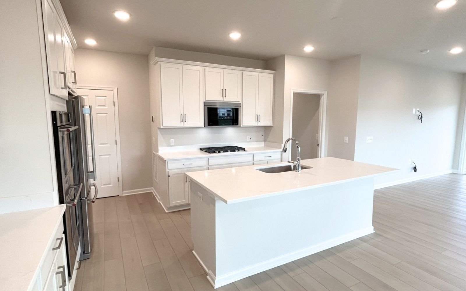 The kitchen in the Hemingway on homesite 2103 at Hiatt Pointe at Snowden Bridge.