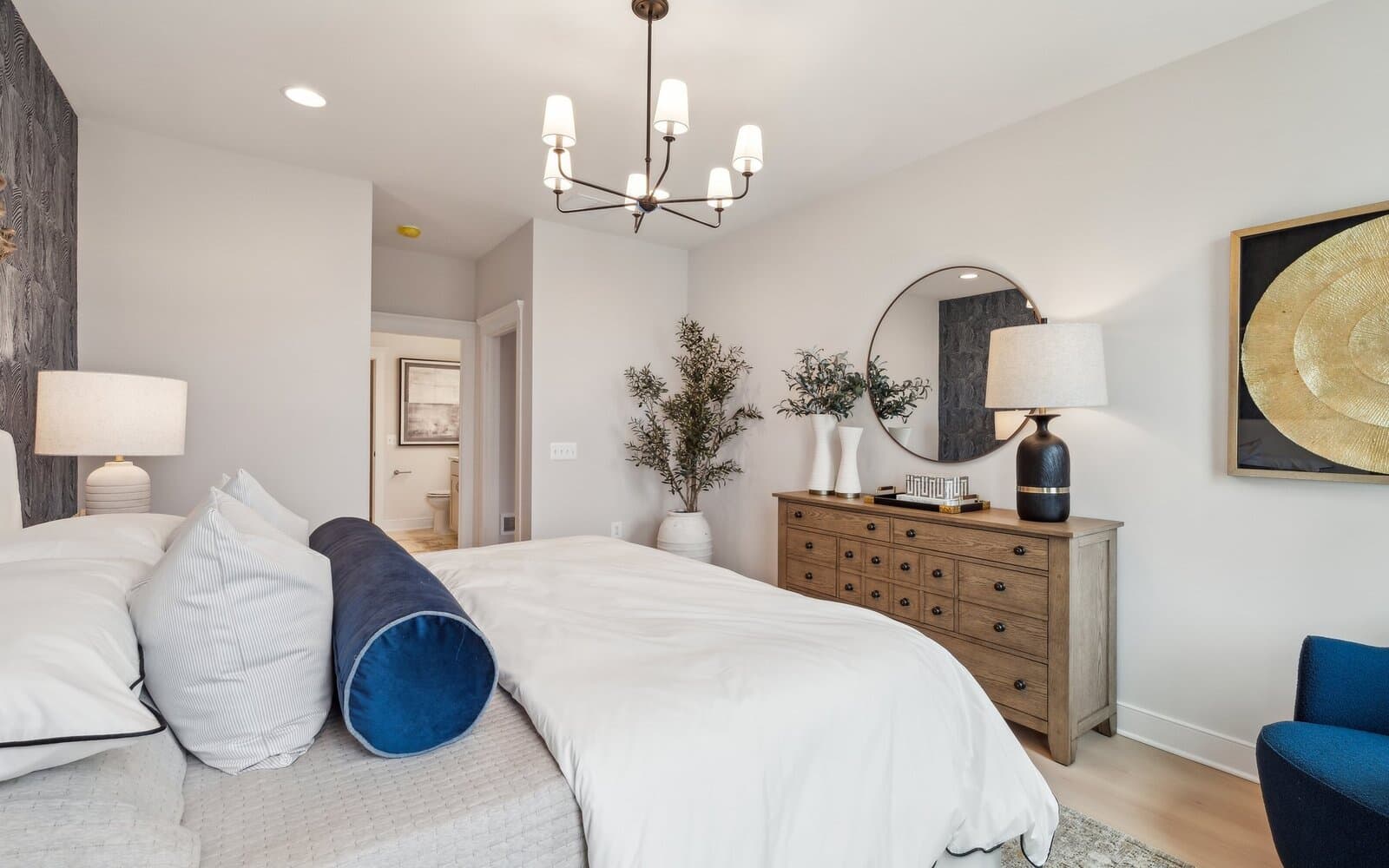 The main level primary bedroom of the Northgate by Brookfield Residential.