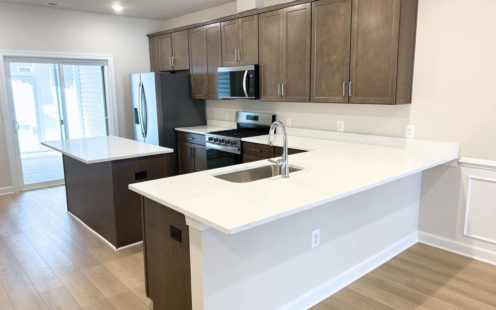 The kitchen of the Northgate on homesite 1103 at Hiatt Pointe at Snowden Bridge.