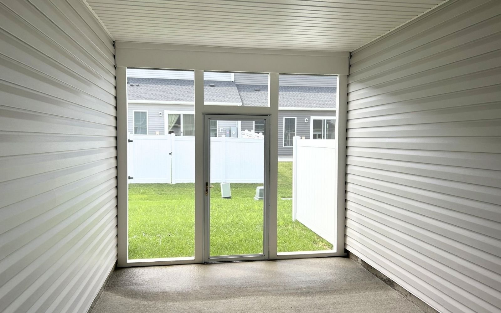 The rear screened porch of the Northgate on homesite 1103 at Hiatt Pointe at Snowden Bridge.