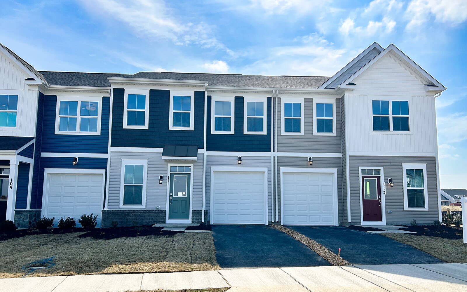The exterior of the Northgate villa home on homesite 1028 at Hiatt Pointe at Snowden Bridge by Brookfield Residential.