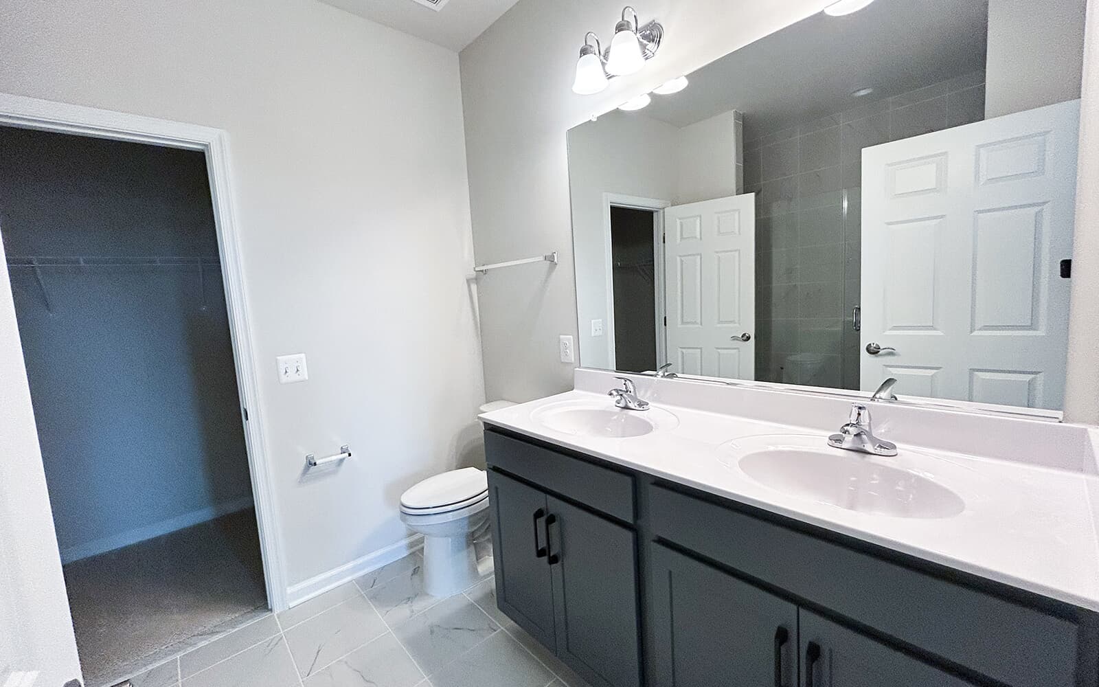 The primary bathroom in the Northgate villa home on homesite 1028 at Hiatt Pointe at Snowden Bridge by Brookfield Residential.